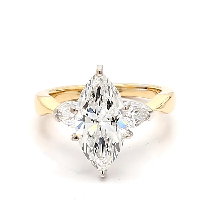 14K Gold Diamond Ring with Pear-Shaped Side Stones