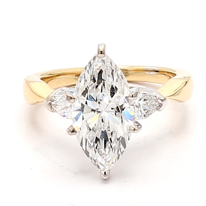 14K Gold Diamond Ring with Pear-Shaped Side Stones