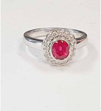 Platinum Oval Ruby and Diamond Ring, 0.30 ct tw
